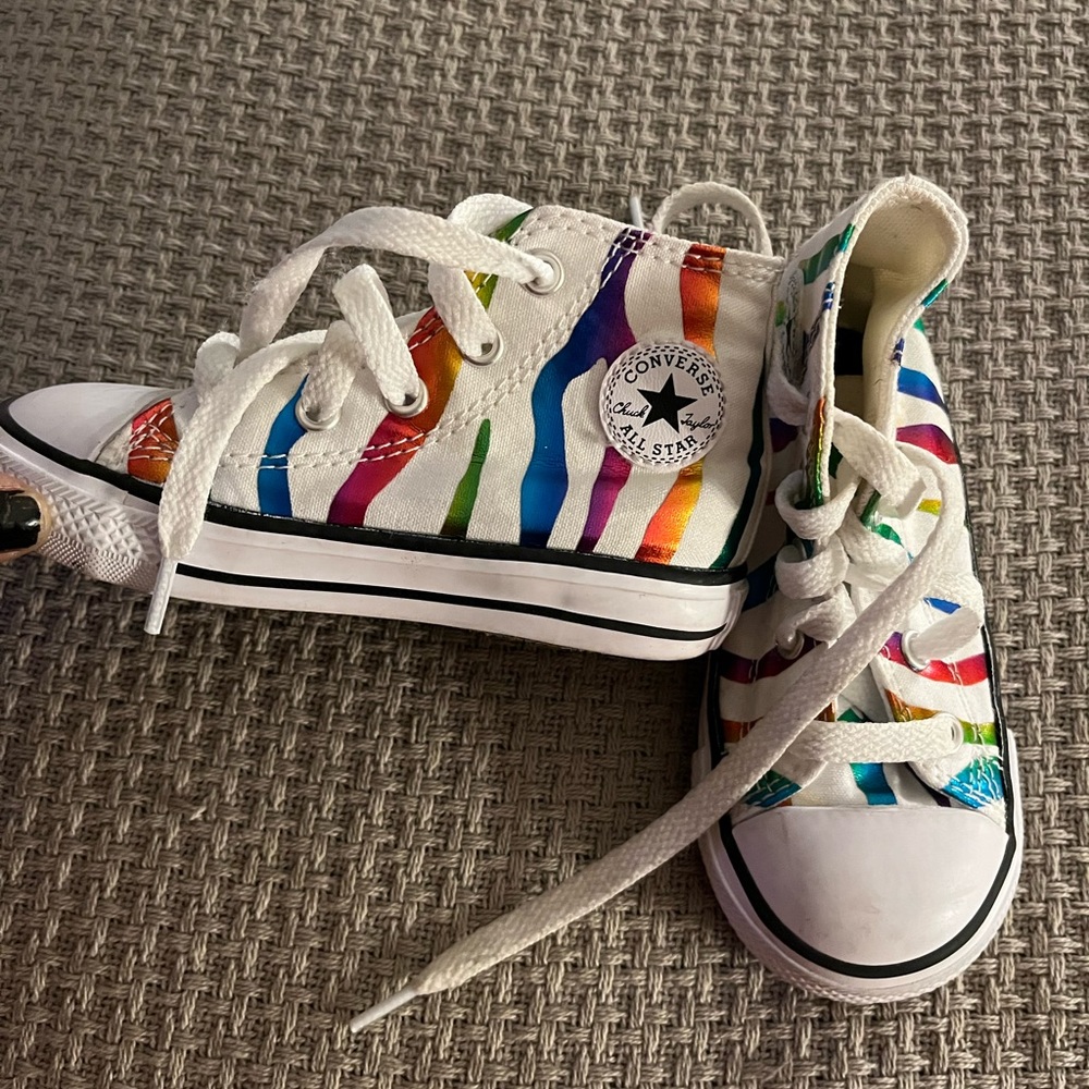 Girls Converse sneakers.